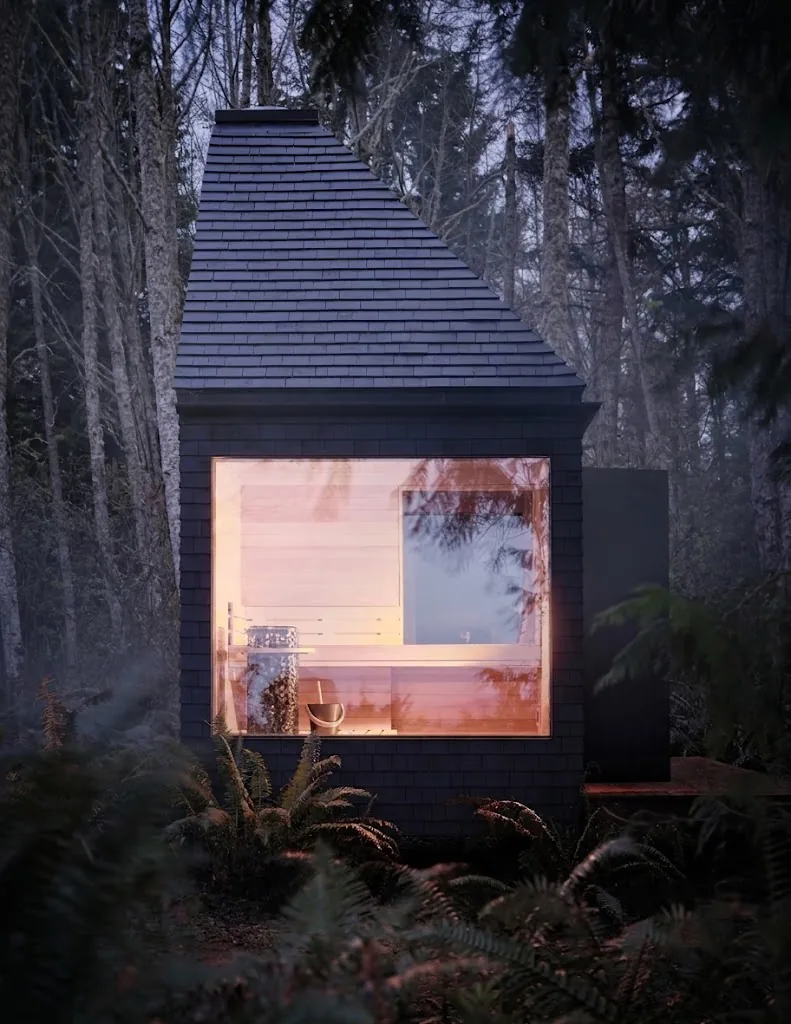Bathhouse glowing in the forest at dusk
